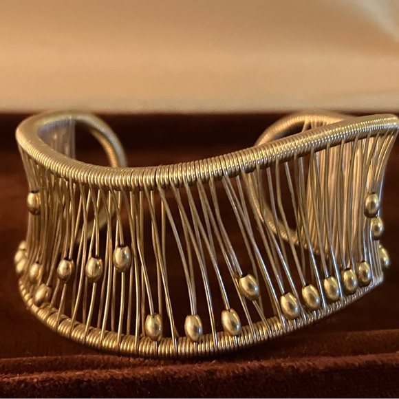 Jewelry - Designer gold bracelet balls move up and down the bracelet with wrist.